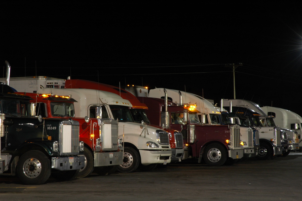 Parked semi truck at night stop during a sleeper berth break